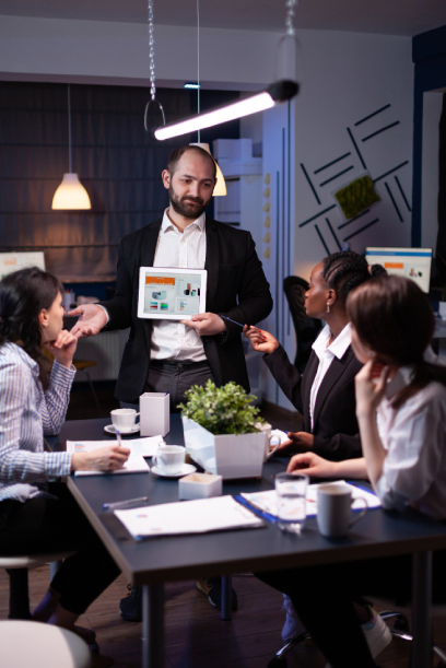 Business entrepreneur man presenting company statistics using tablet for financial presentation